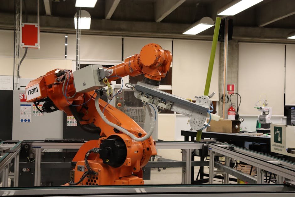 Services Industrial robotic arm in a Ciudad de México lab setting, showcasing automation technology.